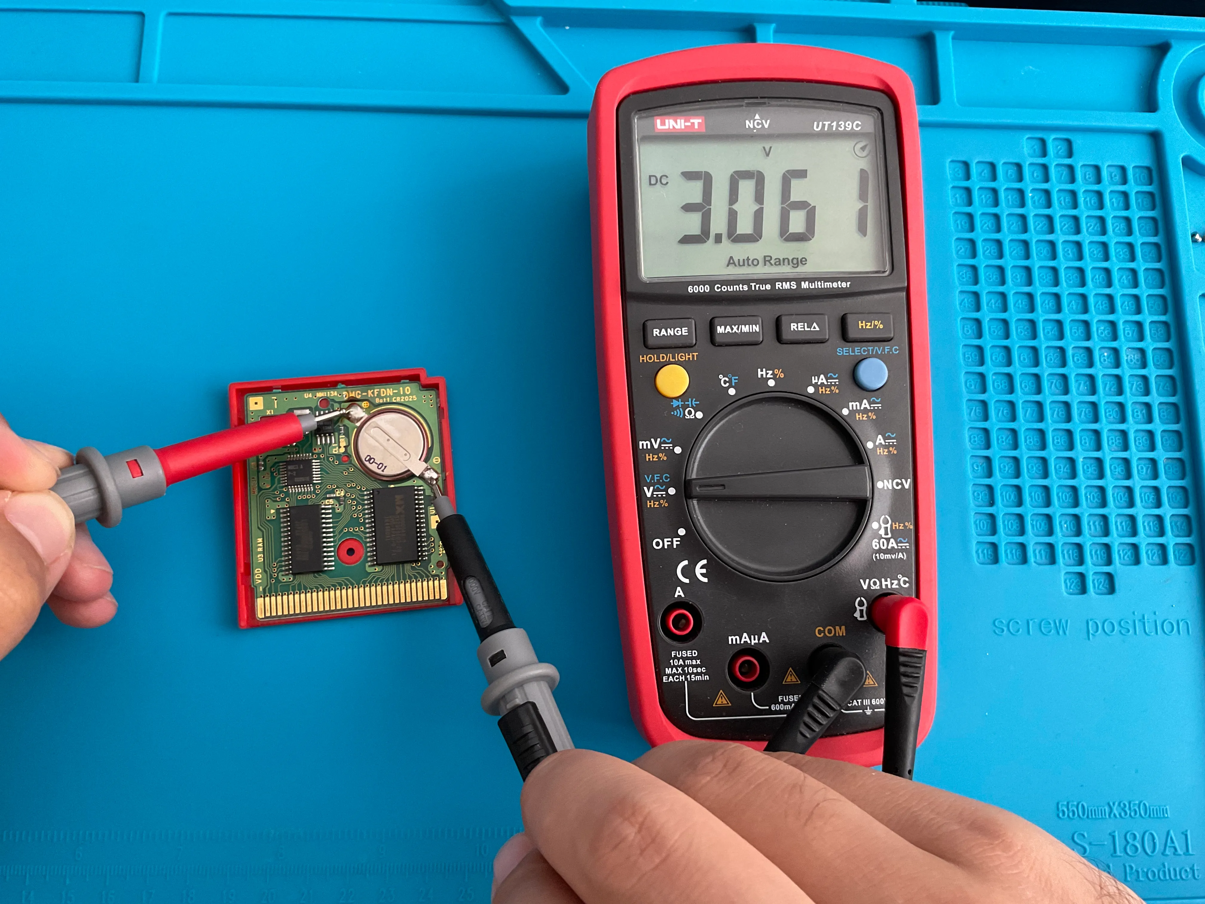 Measuring battery voltage on a cartridge